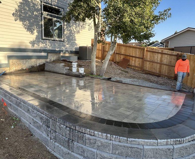 Retaining wall drainage construction in Brighton, CO — Hilltop Landscaping